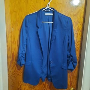 Teal blazer, looks more darker blue in pic. But is teal